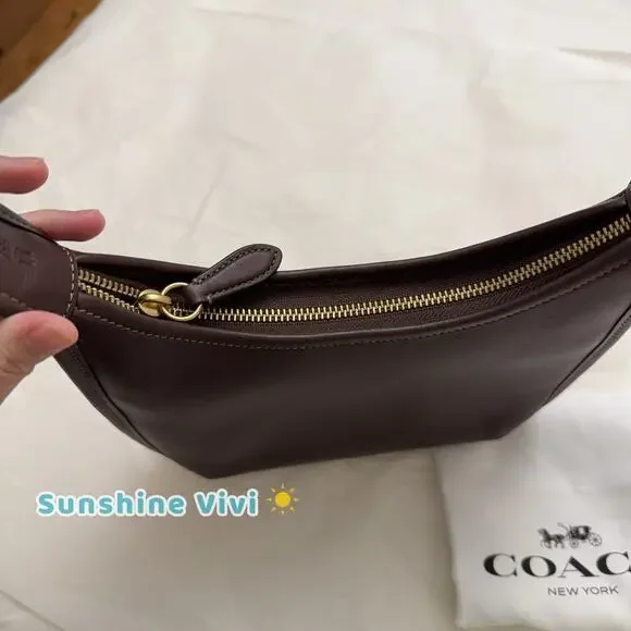 NWT Coach Curve Zip Bag in BRASS/Maple Glovetanned Leather CAF11
